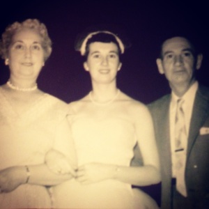 This is a photo of my grandmother (center) and her parents circa late 1940s/early 1950s.  